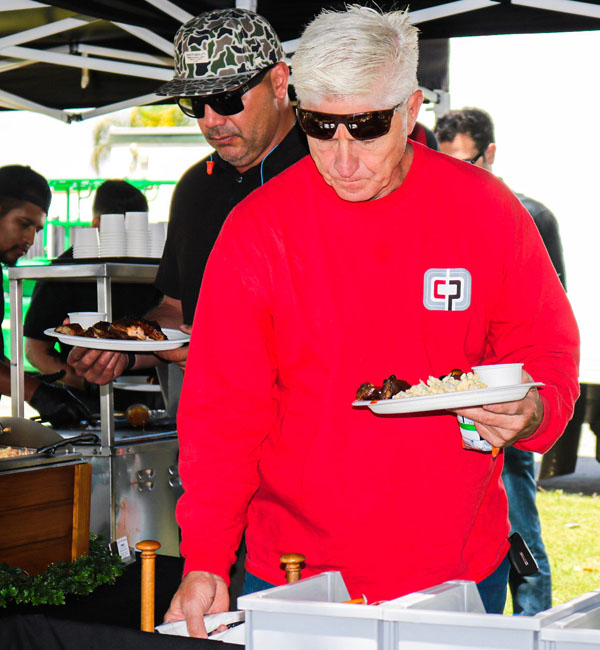 People serving themselves food, catering services